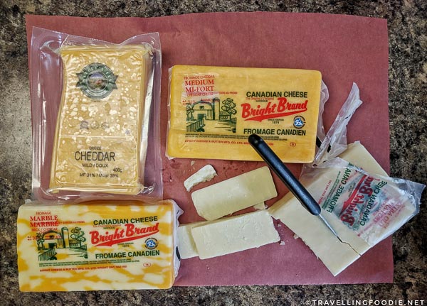 Cheddar, marble, and Chalav Yisrael cheeses at Bright Cheese & Butter in Bright, Oxford County, Ontario