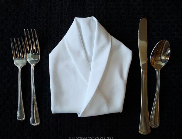 Dining setup with tuxedo napkin at Voyageur Dining Room at Cedar Meadows in Timmins, Ontario