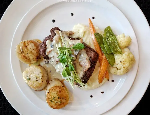 Grilled Elk Striploin with seared scallops at Cedar Meadows in Timmins, Ontario