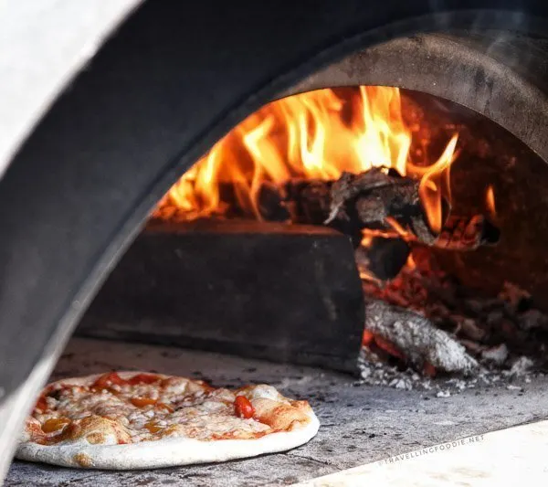 Pizza inside the Wood Fired Oven from Into The Blue Bakery