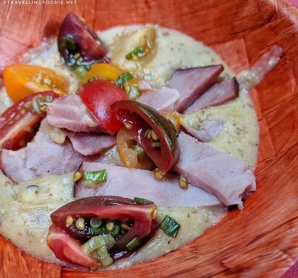 Carved Ham with Cheese Grits and Heirloom Tomato Relish at Schneiders Craft Meatery Event at Big Crow in Toronto, Ontario