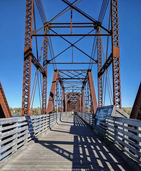 Walking along the Bill Thorpe Walking Bridge in Fredericton, New Brunswick