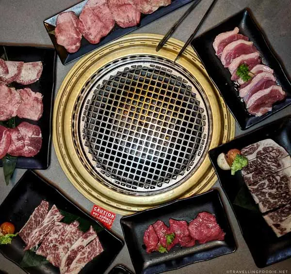 Yakiniku dishes beside the grill at Gyu-Kaku Japanese BBQ in Torrance, California
