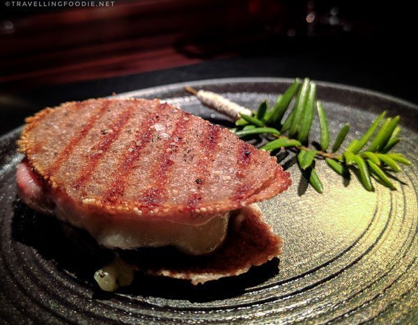 Black truffle wafer with ham and cheese at L’Atelier de Joël Robuchon Montreal