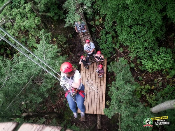 View from the platform of someone rappelling at Long Point Eco Adventures in St. Williams, Norfolk County, Ontario