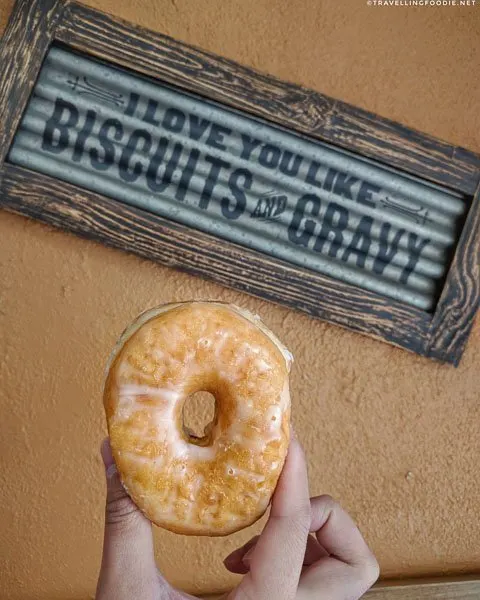 Donut with I Love You Like Biscuits and Gravy Sign at Mr. Bill's Donuts in DeLand, West Volusia, Florida