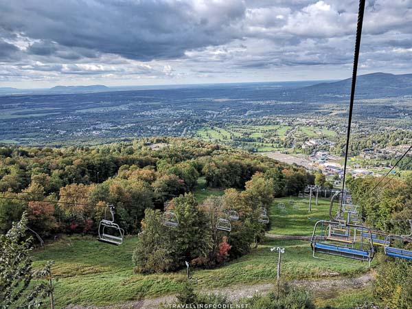 Chair lift going down at Ski Bromont in Bromont, Quebec