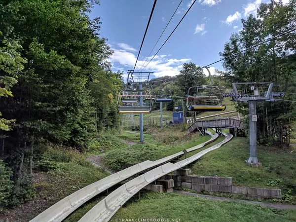 View going up the lift with luge and bike tracks at Ski Bromont, Eastern Townships, Quebec