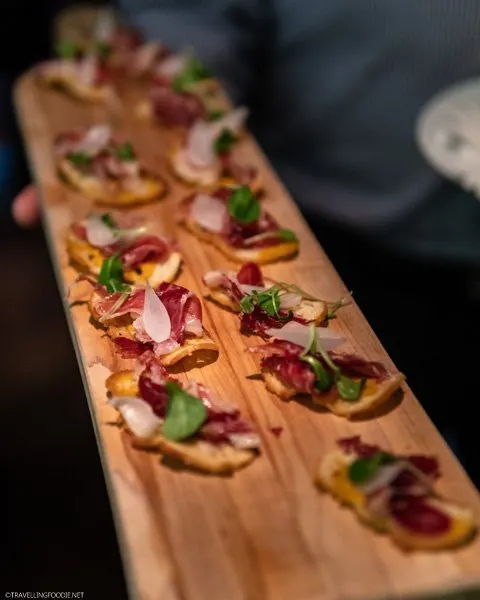 Cured meat on crostini at Ferreira Cafe in Montreal, Quebec