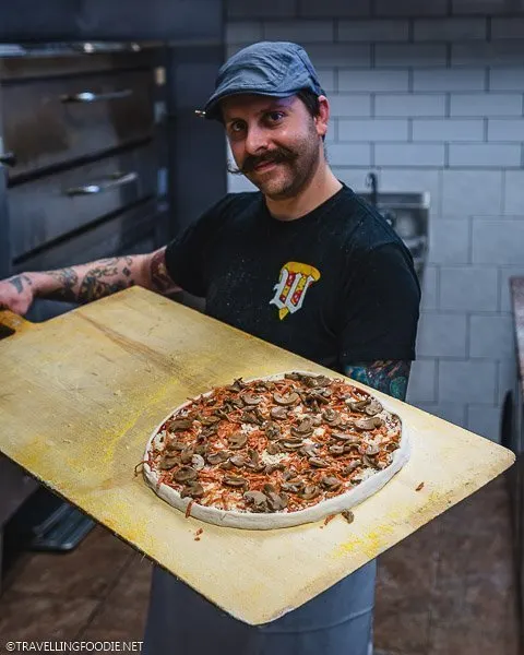 Pizza Chef Dean Litster making pizza at Armando's Pizza in Windsor, Ontario