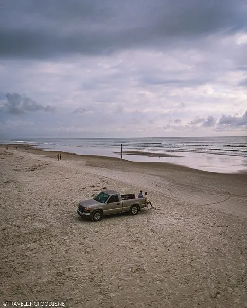 Car on the the Beach at Daytona Beach Shores, Florida