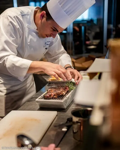 Chef preparing steak