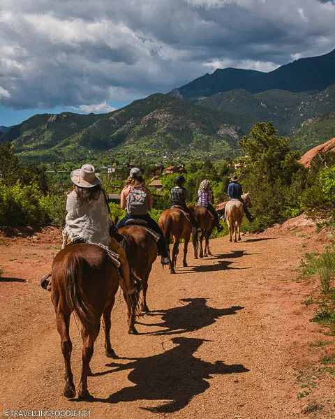 Horseback Riding Group in a straight line at Garden of the Gods