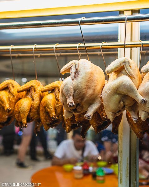 Soy Sauce Chicken and Hainanese Chicken on display at Hainanese Delicacy in Singapore