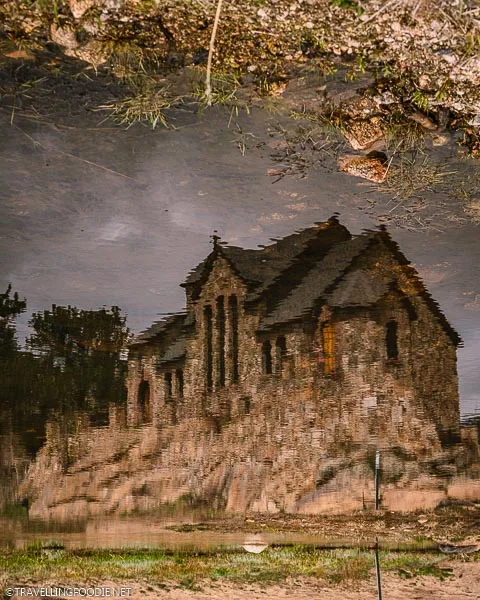 Reflection of Saint Catherine's Chapel on the Rock on the pond at Allenspark
