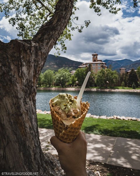 Holding Cafe Julie's Gelato on Waffle Cone on The Broadmoor grounds in Colorado Springs