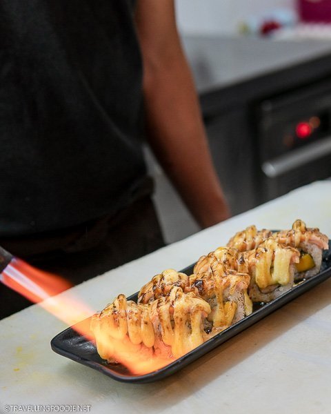 Torching the Aburi Salmon Maki at Manila's Akimitsu Tendon
