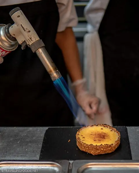 Torching the Calamansi Tart at Manam Cafe in Manila, Philippines