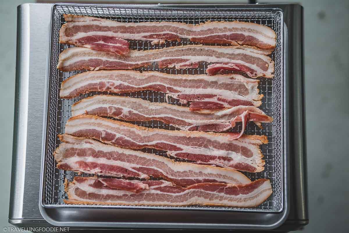 Strips of Bacon on an Air Fryer Basket