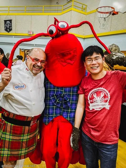Chef Alain Bosse and Travelling Foodie Raymond Cua with Lobster Mascot at Lobster Chowder Chowdown Showdown in Chester, Nova Scotia