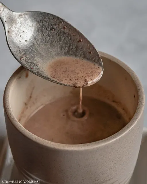 Close-up of pouring Filipino hot chocolate