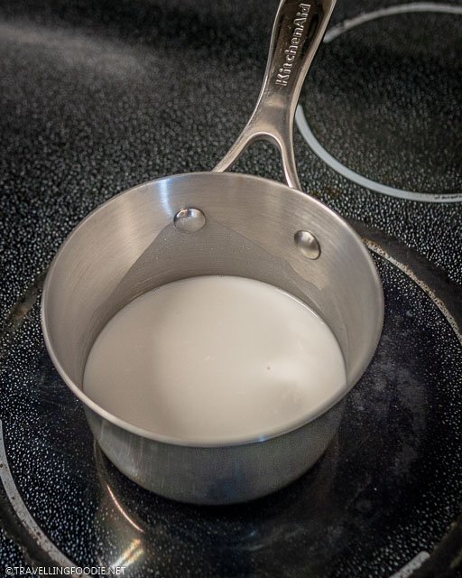 A Pot of Milk on a Stove
