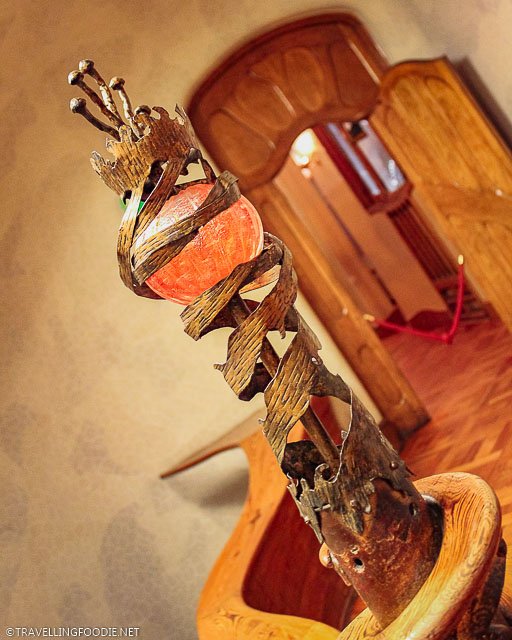 Orbed Scepter on oak staircase at Casa Batllo in Barcelona