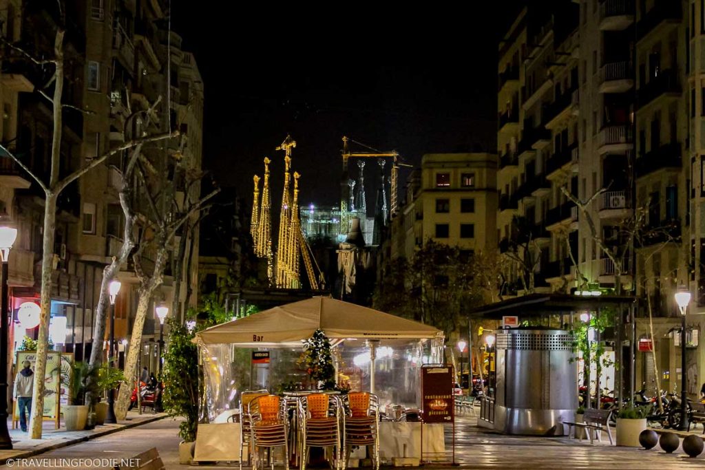 Sagrada Familia construction at night on the streets of Barcelona, Spain