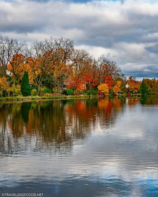 Fall foliage reflections at Lake Victoria along Avon River in Stratford, Ontario