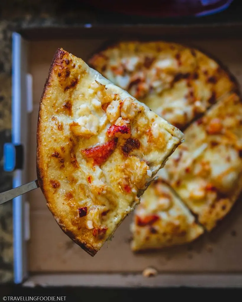 A Slice of Lobster Pizza at Port Grocer in Port Medway, Nova Scotia