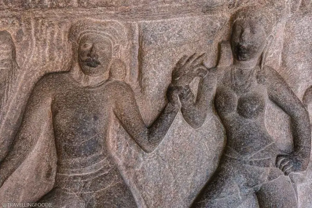 Krishna Mandapam carving man pulling woman