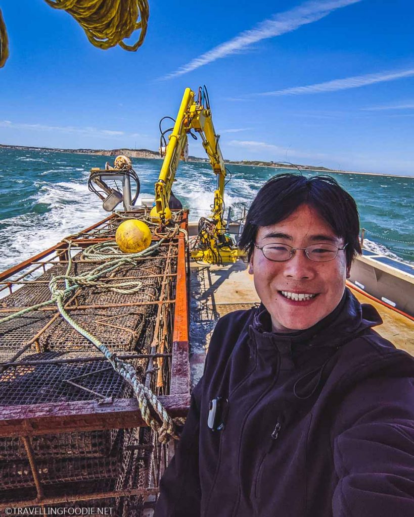 Travelling Foodie Raymond Cua on oyster fishing Les Cultures du Large boat in Magdalen Islands