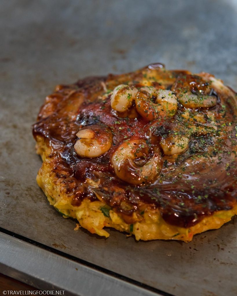 Traditional Japanese Food Okonomiyaki at Okonomiyaki Kiji in Osaka, Japan