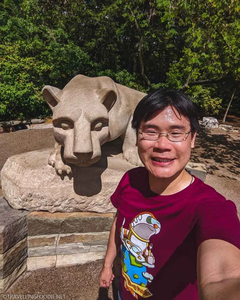 Travelling Foodie Raymond Cua selfie with Nittany Lion shrine at Penn State in State College, PA