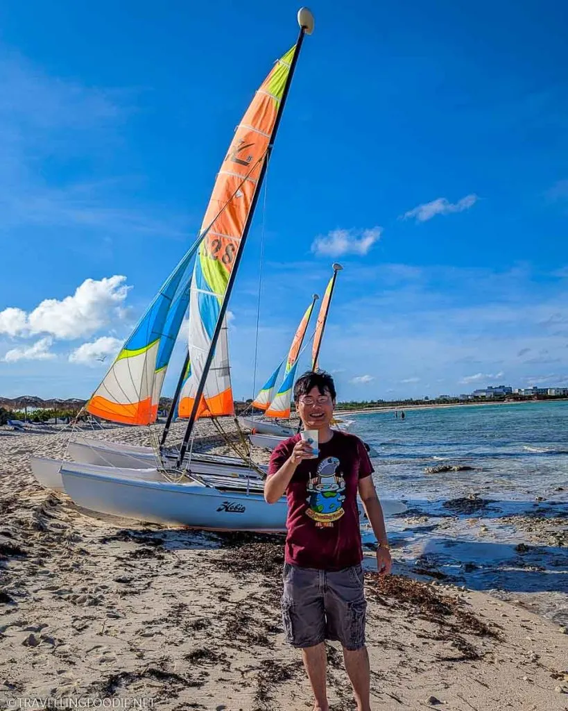 Travelling Foodie Raymond Cua enjoying beer at Playa Beach at Gran Muthu Imperial in Cayo Coco, Cuba