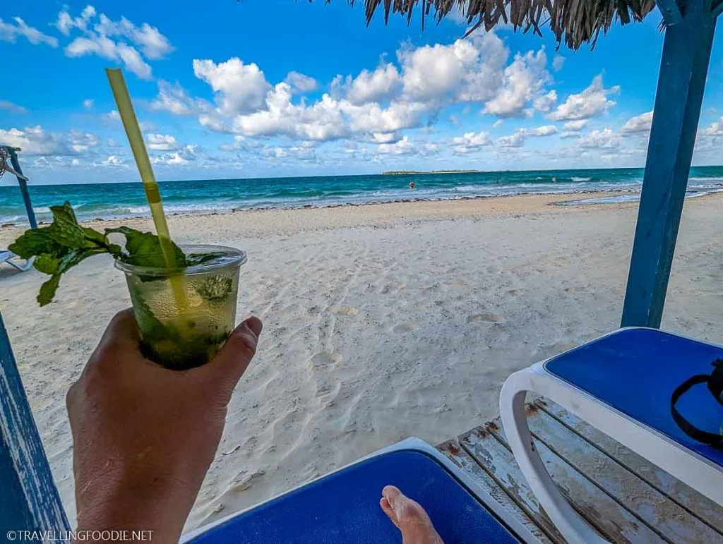 Relaxing at the cabana with a mojito at Playa Pilar Beach in Cayo Guillermo, Cuba