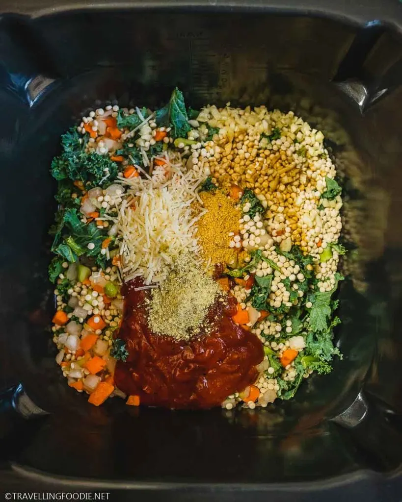 Mirepoix, pearl couscous, kale, Italian blend, garlic, breadcrumb, vegetable stock powder, marinara sauce, parmesan and Italian herbs on Ninja Speedi Pot