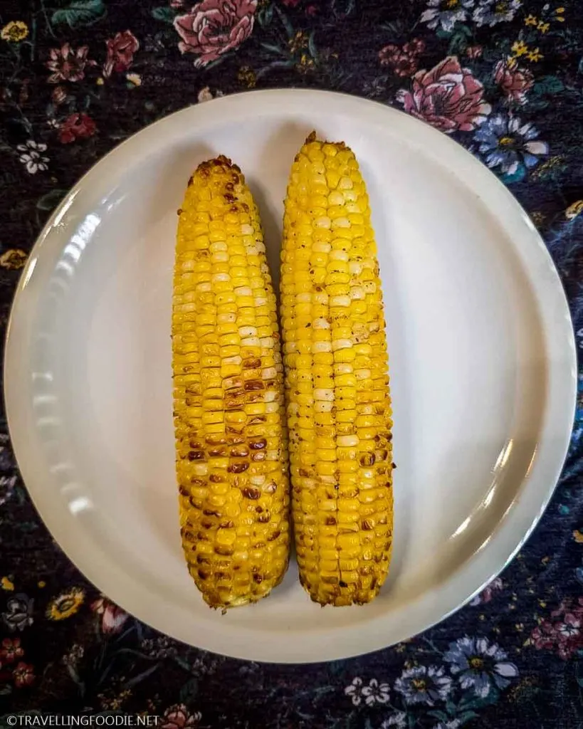 Two ears of cooked Corn on the Cob on Plate