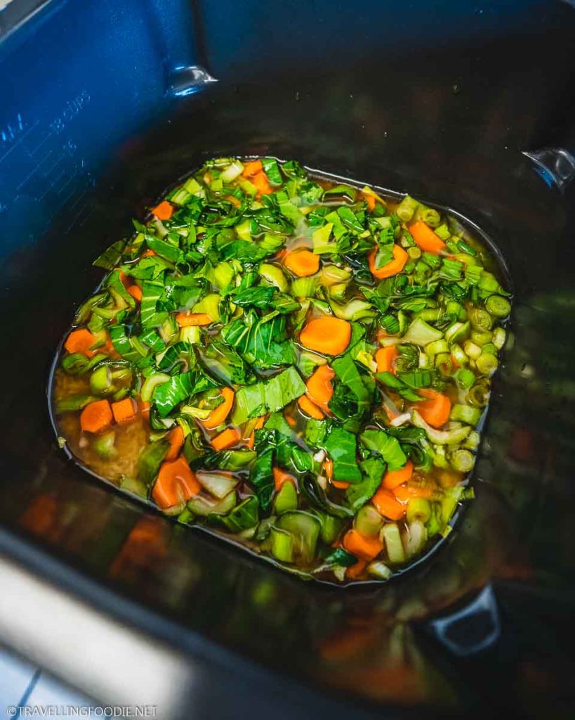 Uncooked Rice, Soy Sauce, White Wine Vinegar, Carrots, Minced Garlic, Shanghai Bok Choy, Green Onions, on Ninja Speedi Pot