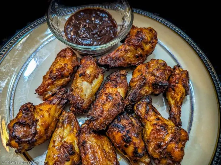 Cooked Frozen Chicken Wings on Plate with BBQ Sauce