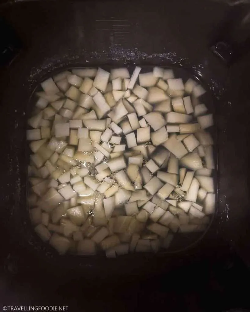 Diced potatoes and water on Ninja Speedi pot