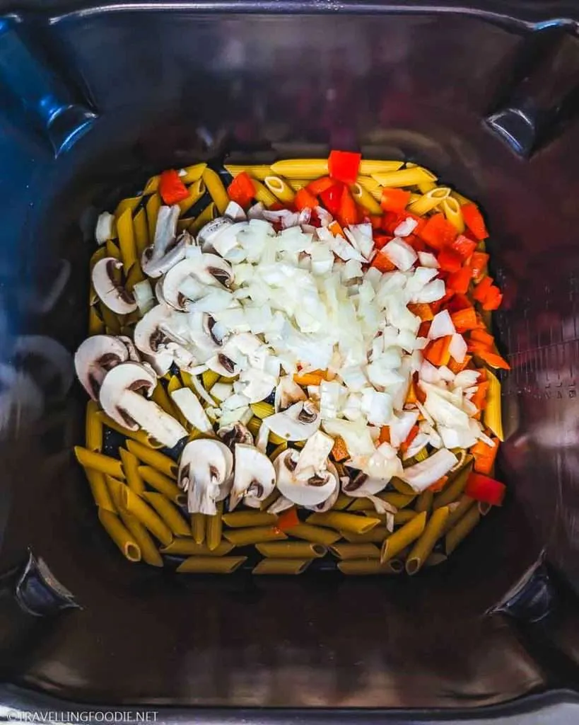 Penne, Diced Onions, Sliced White Mushrooms, Diced Bell Peppers on Ninja Speedi Pot