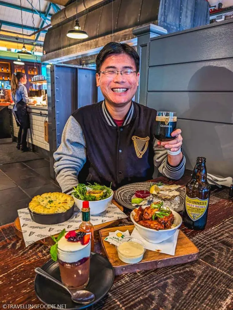 Travelling Foodie Raymond Cua with food and beer at 1837 Bar & Brasserie at Guinness Storehouse in Dublin