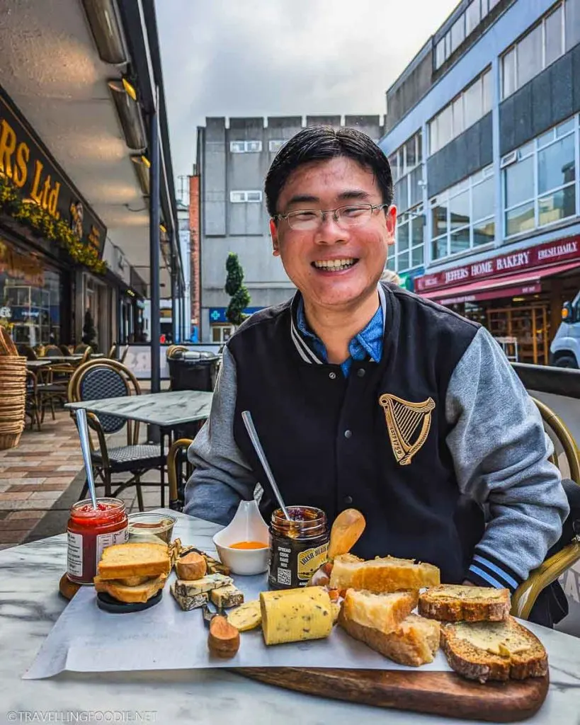 Travelling Foodie Raymond Cua enjoying Sawers at Belfast Taste & Tour - Ireland Foodie Experiences
