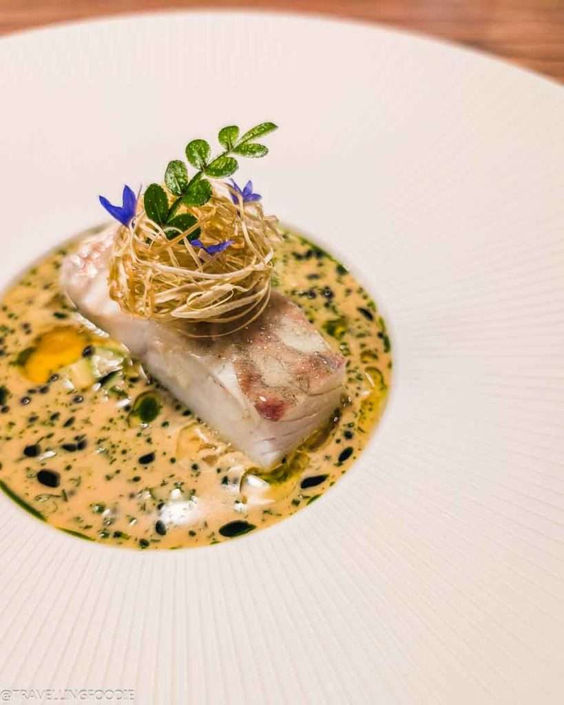 Spanish Fish with Sauce at Moonrise, One Michelin Star Restaurant in Dubai