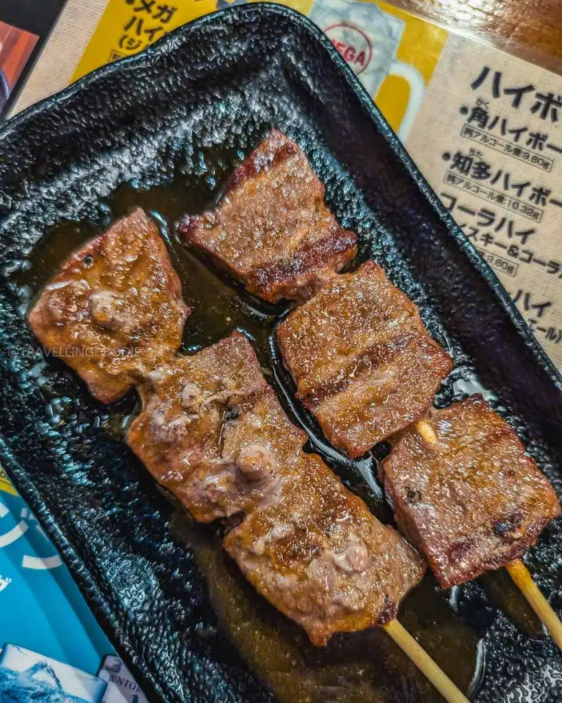 Grilled beef skewers at Yakitori Torizoku, one of the best restaurants in Asakusa Tokyo