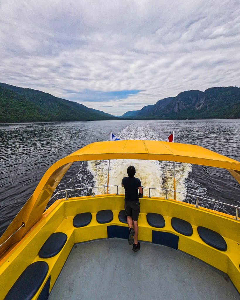Travelling Foodie Raymond Cua admiring the Saguenay Fjord from the cruise