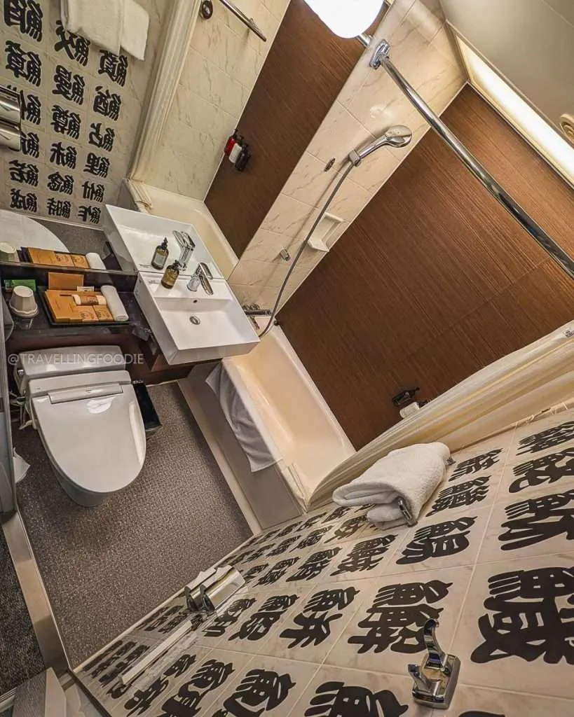 Bathroom with Japanese toilet inside Artist Room at Park Hotel Tokyo
