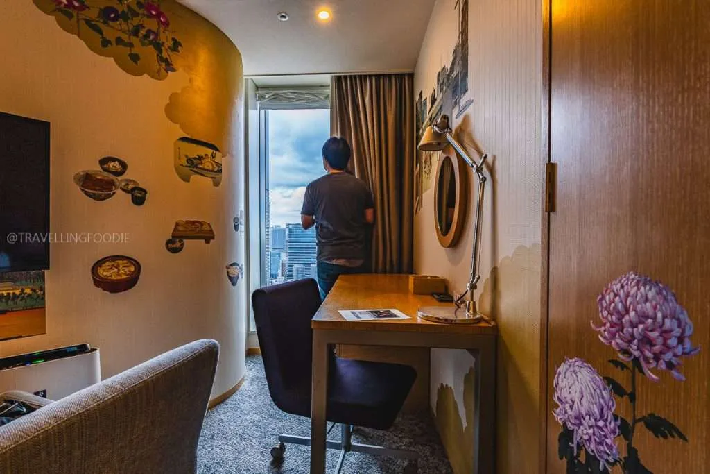 Travelling Foodie Raymond Cua admiring the view at Park Hotel Tokyo