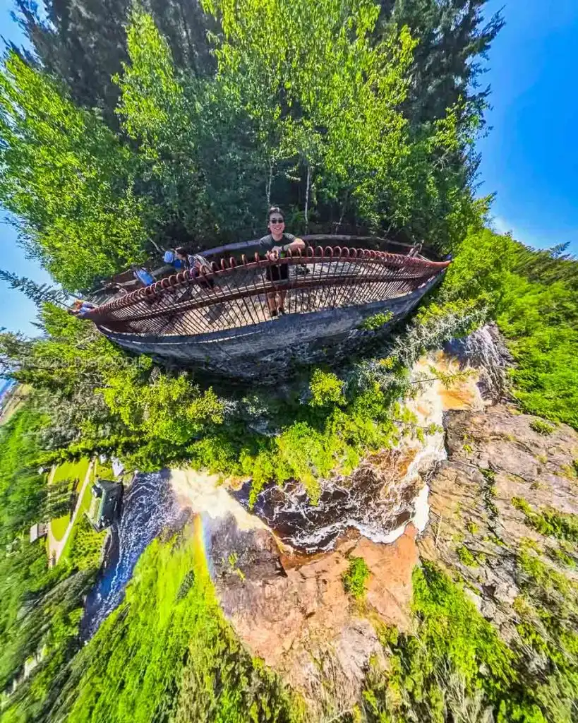 Travelling Foodie Raymond Cua on top of Ouiatchouan Falls view point in Val-Jalbert in Saguenay, Quebec